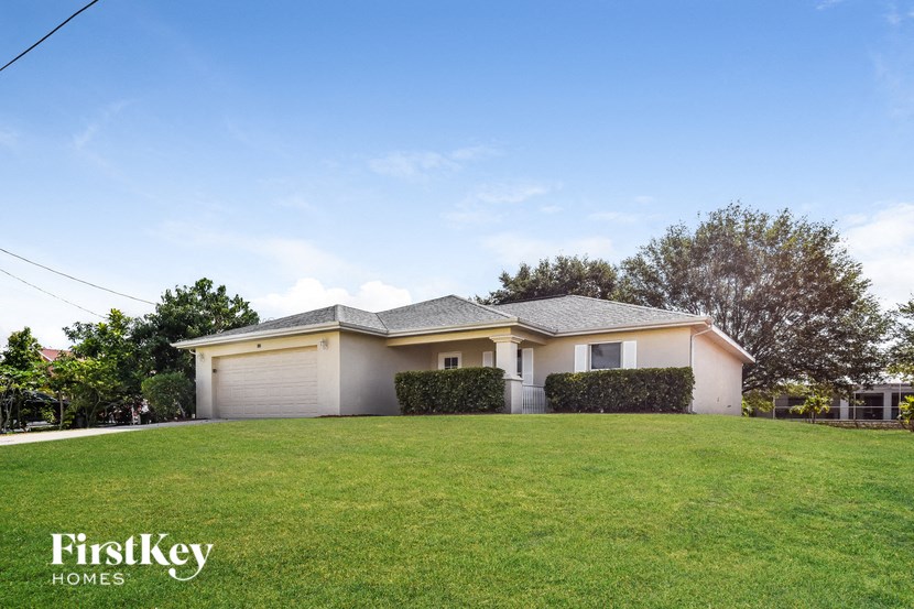 a house with a lawn in front of it