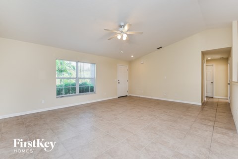 the spacious living room is clean and ready for you to use