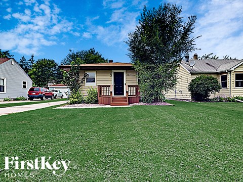 a house with a lawn in front of it