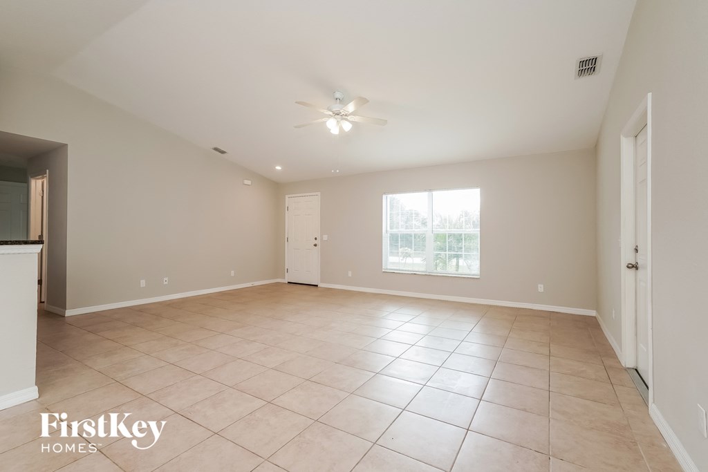 the spacious living room is clean and ready for you to use