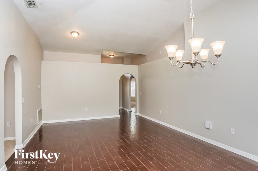 the living room and dining room are empty and ready for you to move in