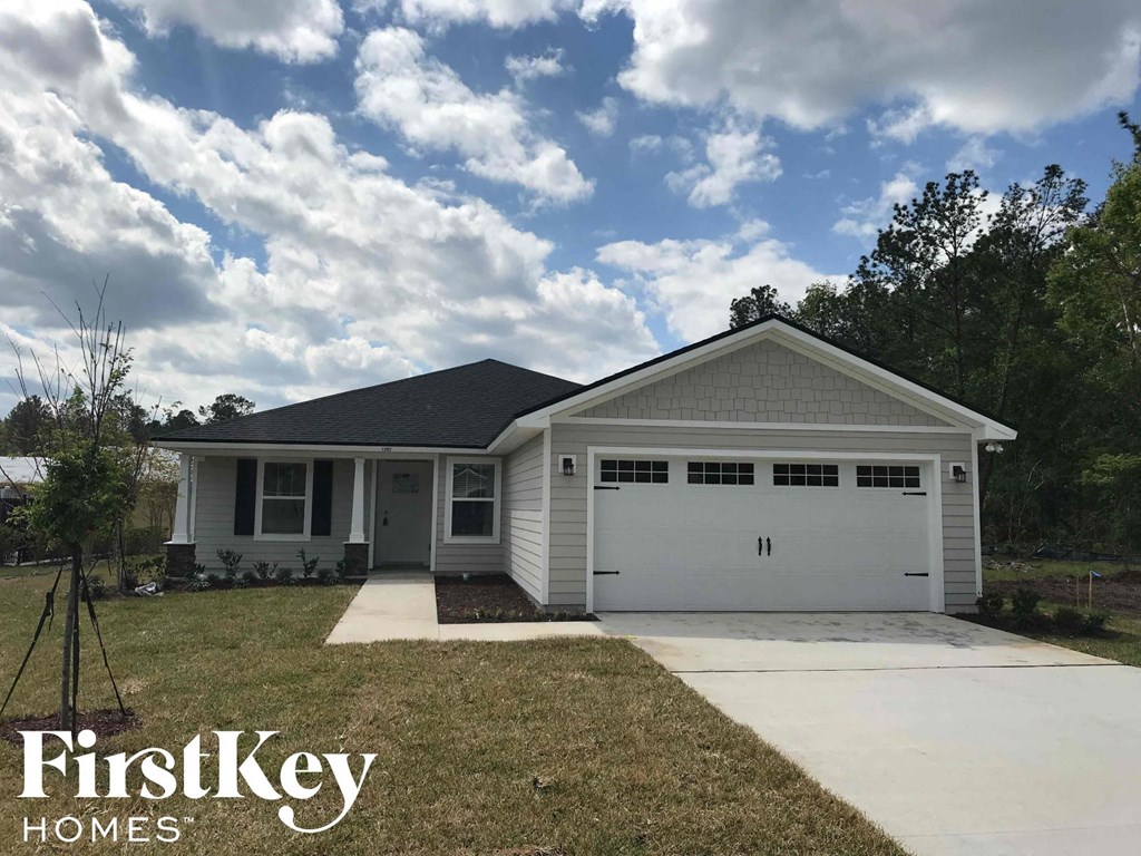 A two-car garage is attached to a house.