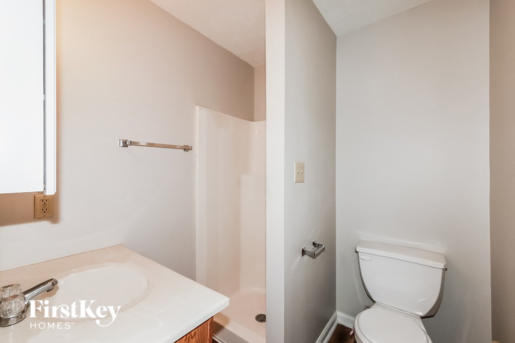 a small bathroom with a toilet and a sink