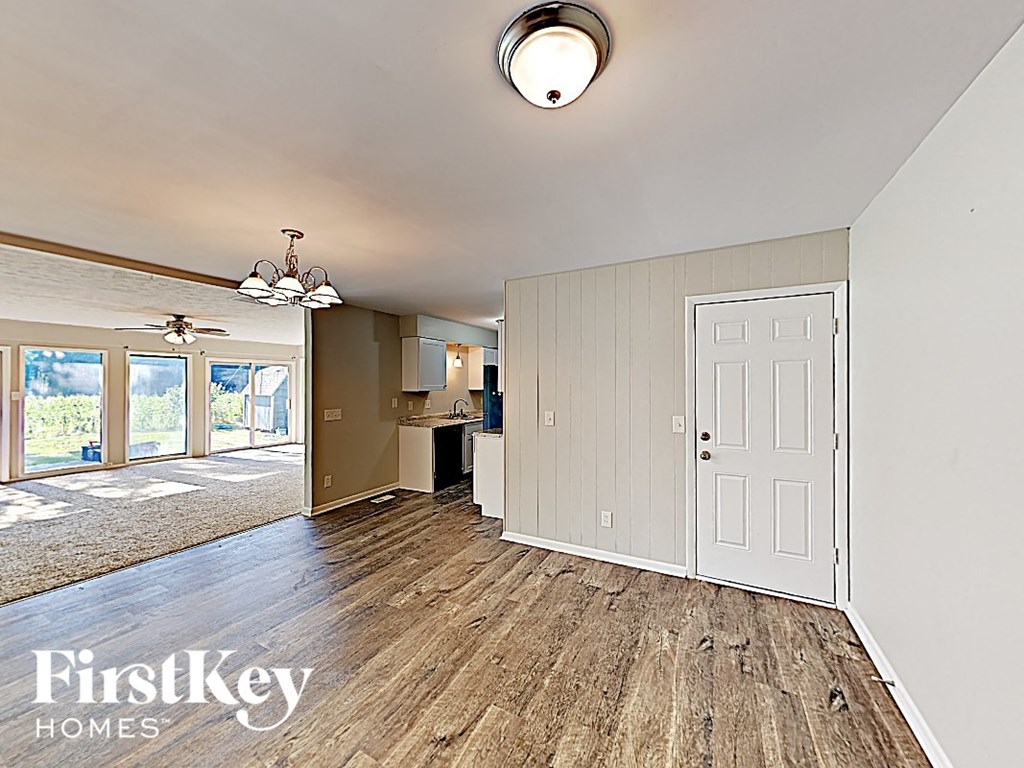 the living room and dining room are open to the kitchen and living room