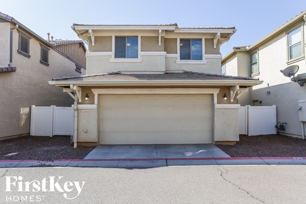 a garage door in front of a house