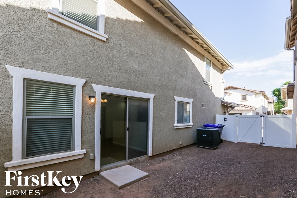 a side view of a house with an open door