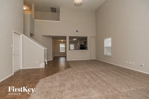 the living room and dining room are spacious and open to the kitchen