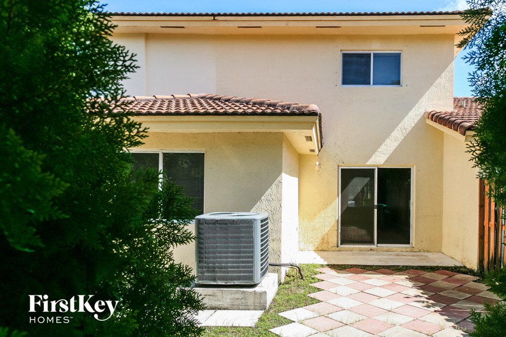 an air conditioning unit outside of a house