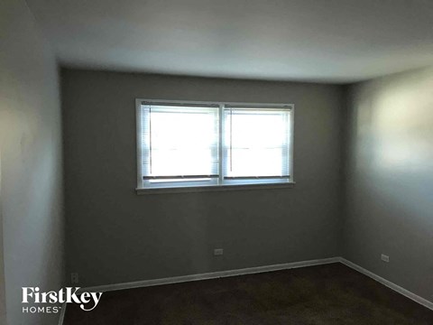 an empty room with a window in it