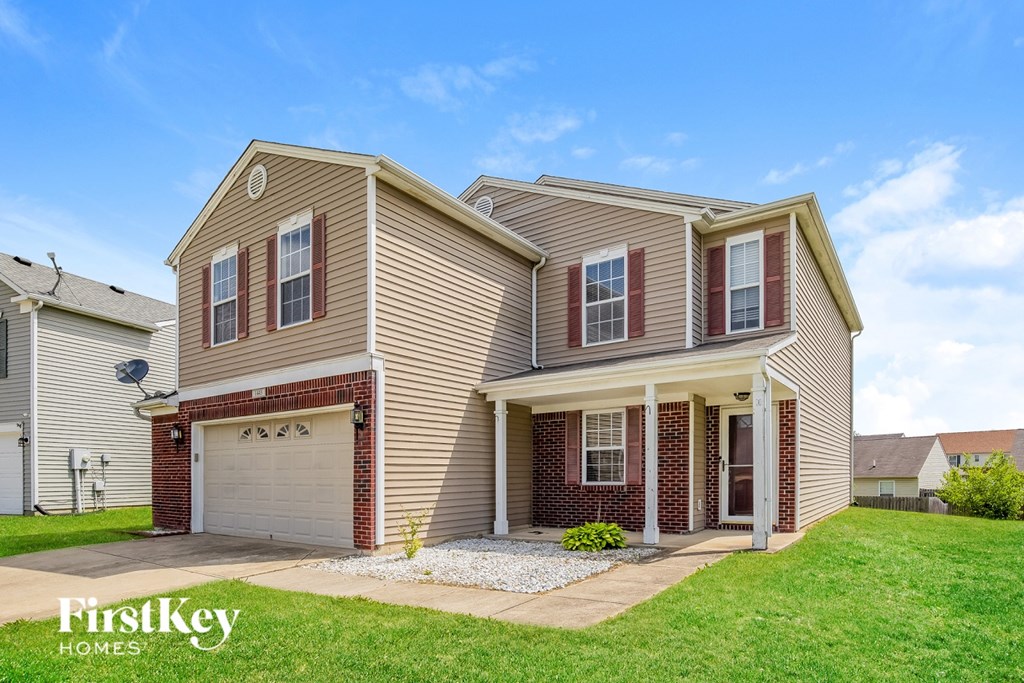 A house with a garage is for sale by FirstKey Homes.