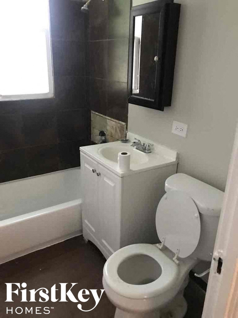 a small bathroom with a toilet and a sink