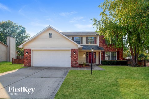 A house with a garage is for sale by FirstKey Homes.