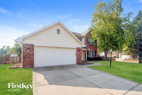 A house with a garage is for sale by FirstKey Homes.
