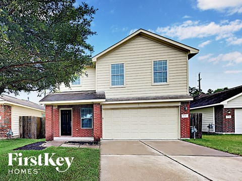 a house with a driveway in front of it