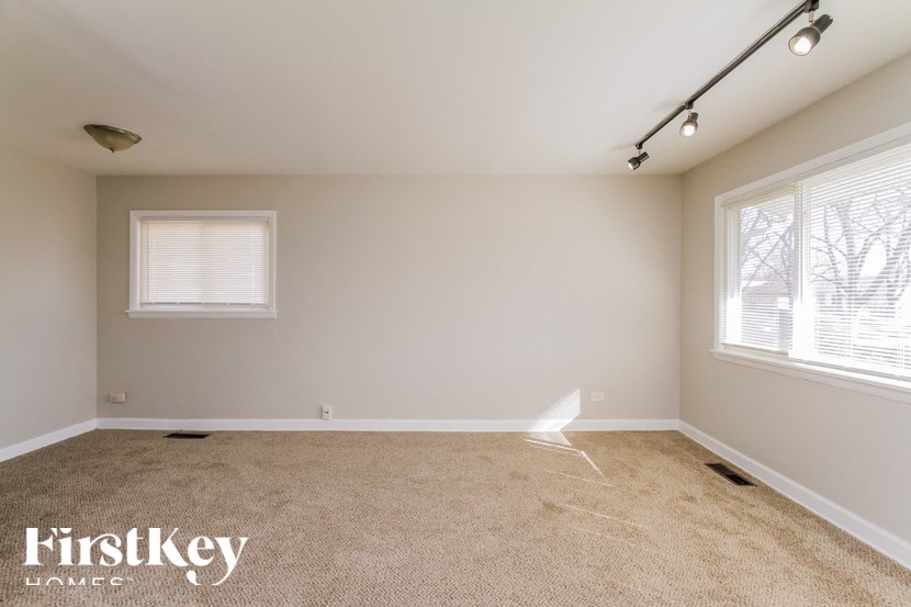 the living room is clean and ready to use