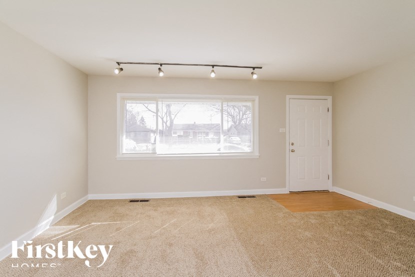 the living room is clean and ready to use