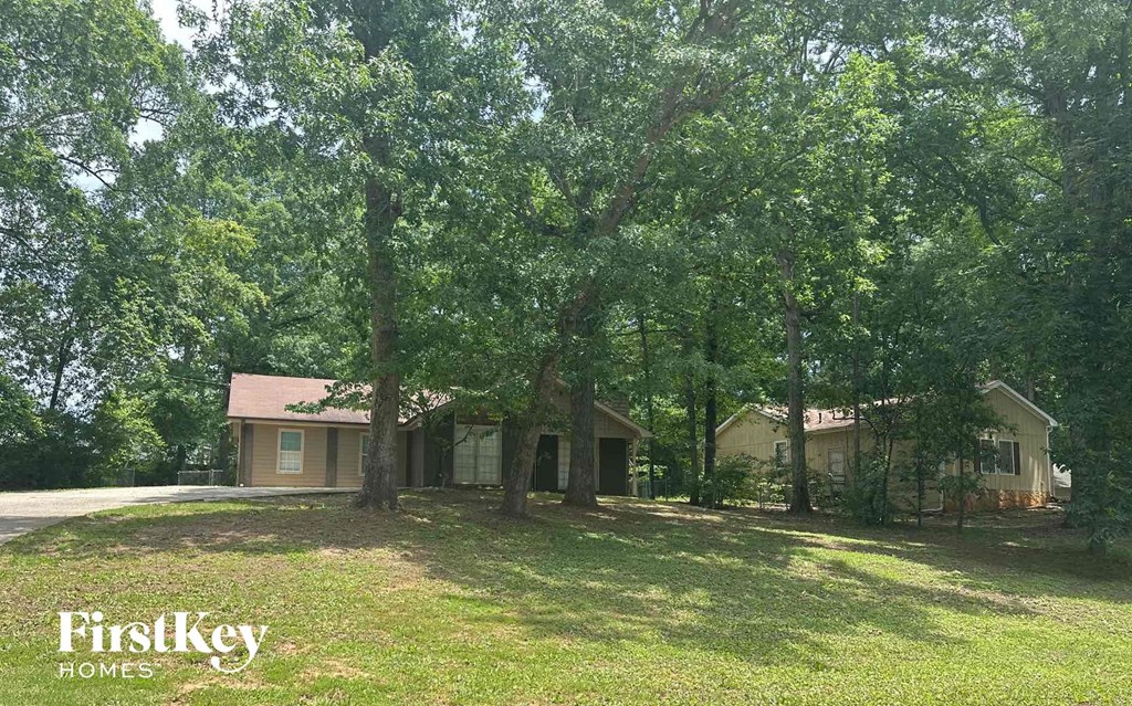 a house with trees in front of it