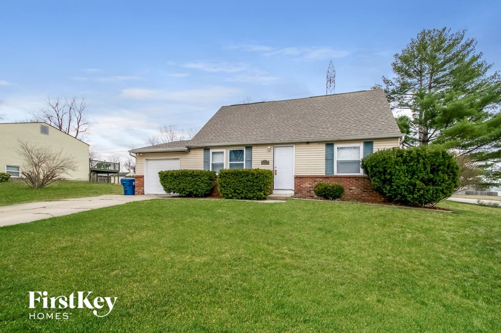 a home with a lawn in front of it
