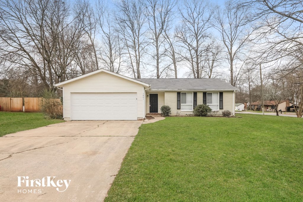 A house with a garage is for sale by FirstKey Homes.