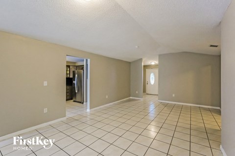 the living room and dining room are spacious and open to the kitchen