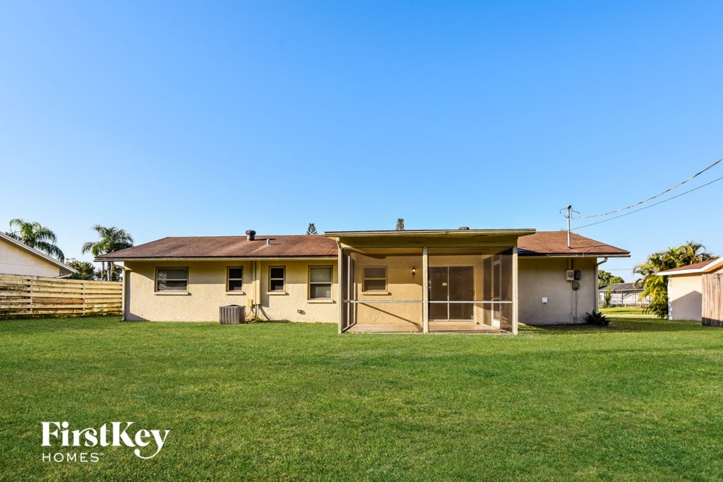 A house with a lawn in front of it is for sale with FirstKey Homes.