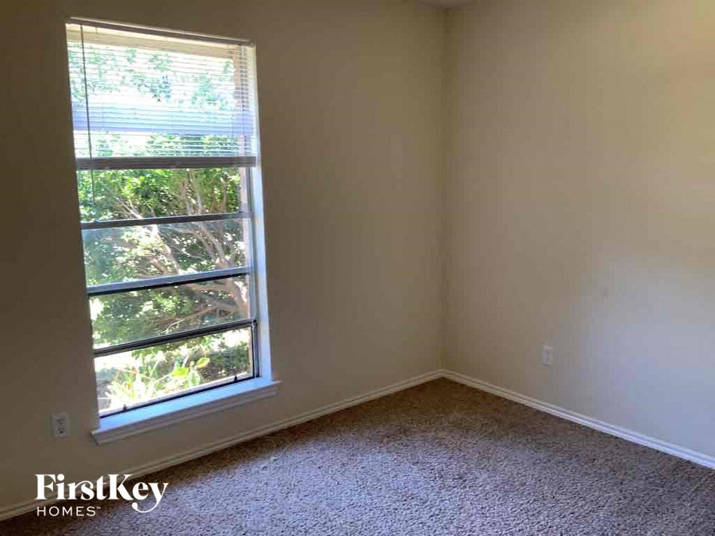 an empty room with a window in it