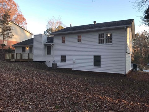 a view of the back of the house from the yard