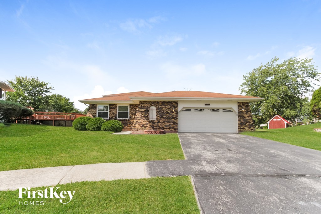 A house with a garage is for sale by FirstKey Homes.