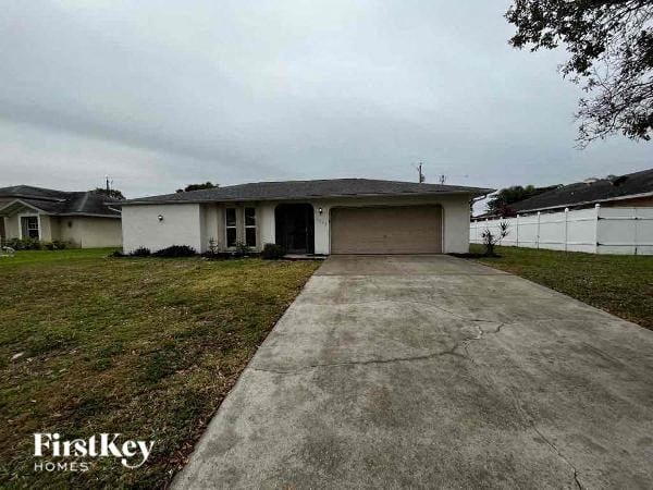 A house with a garage is for sale.