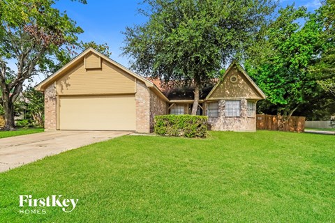 A house with a garage is for sale by FirstKey Homes.