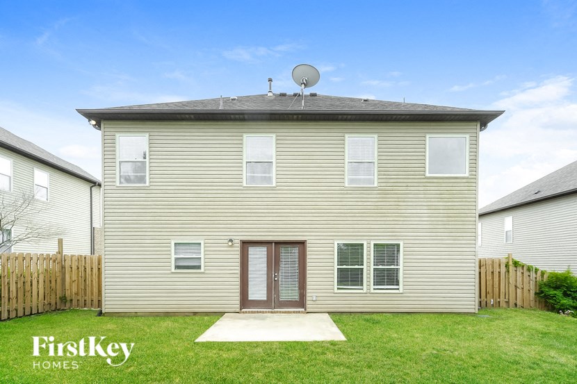 a renovated house with a satellite dish on the roof