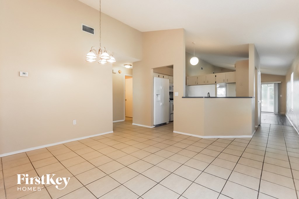 the living room and kitchen are spacious and open to the dining room