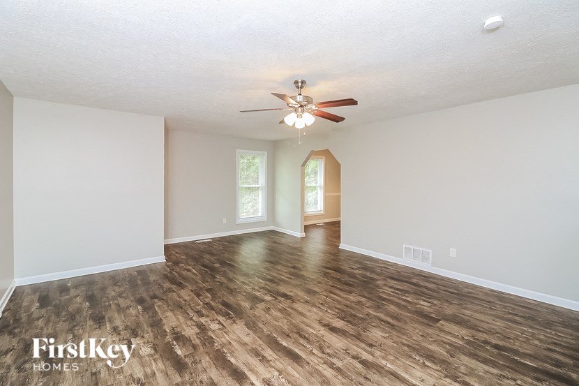 the living room is clean and ready for us to move in
