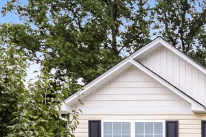 A two-story house with a garage is for sale by FirstKey Homes.