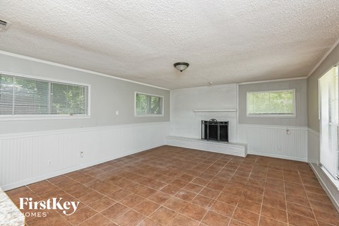 the living room of a house with a fireplace