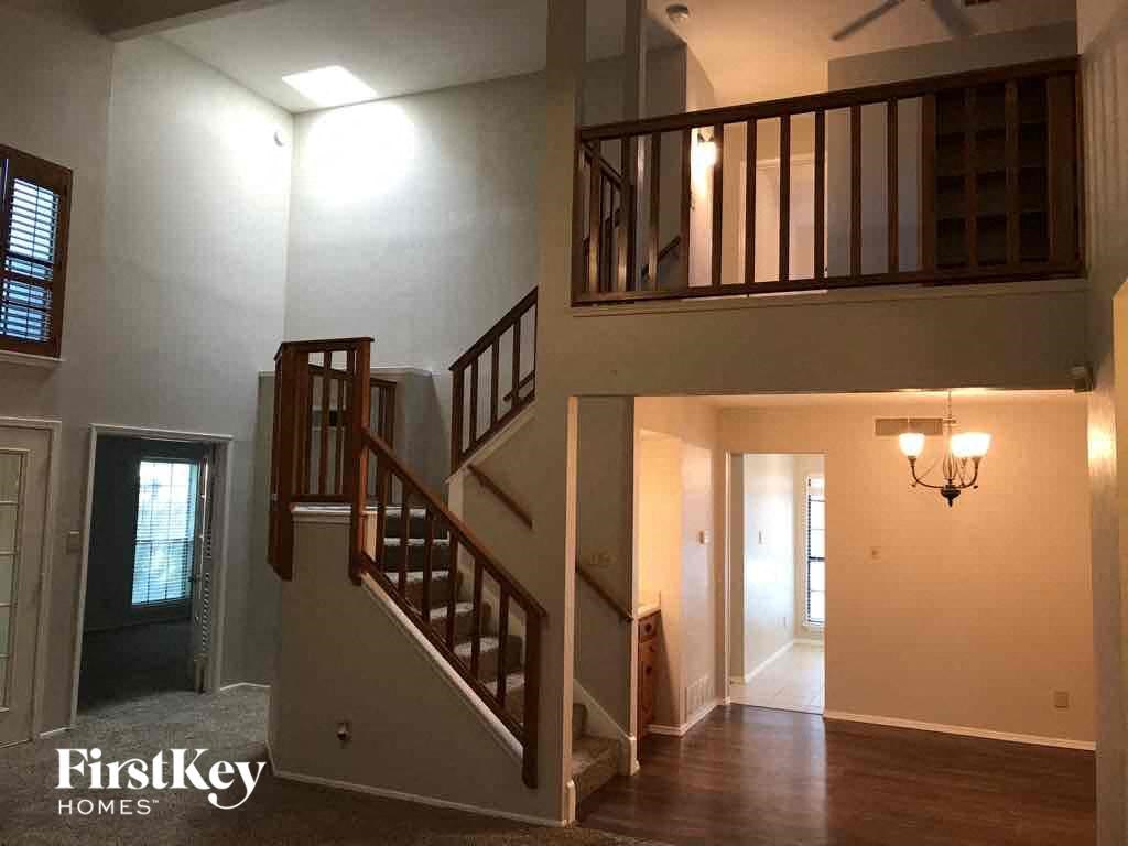 a view of a staircase in a house from the living room