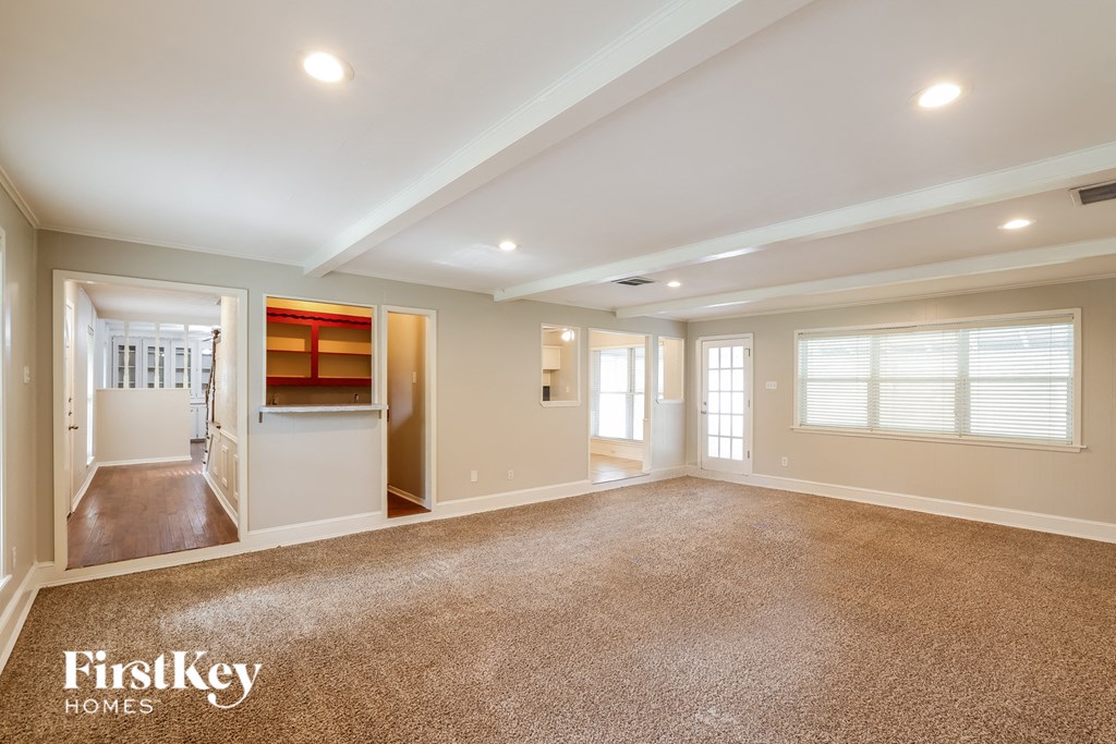 the living room and dining room are spacious and ready for entertaining