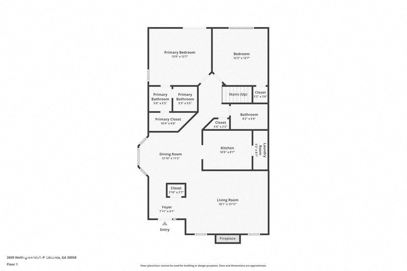 A floor plan of a house with a living room, dining room, kitchen, and two bathrooms.