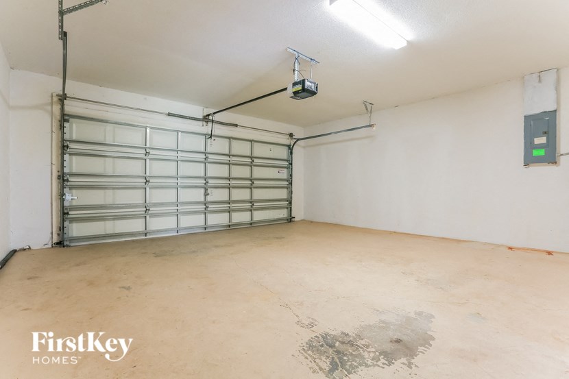 A garage with a FirstKey Homes logo.