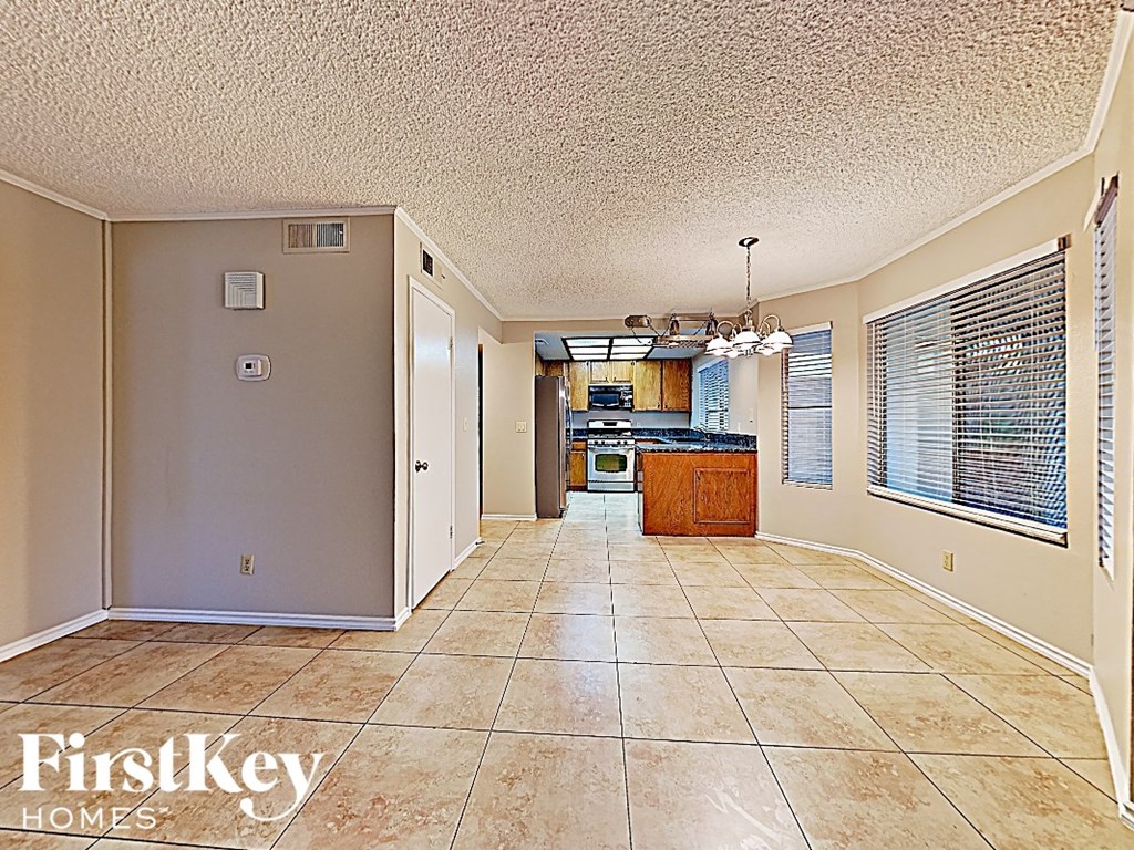 the spacious eat in kitchen is open to the living room and dining room