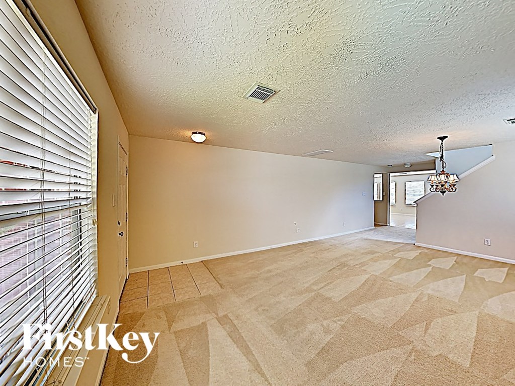 the living room and dining room are empty and ready for you to use