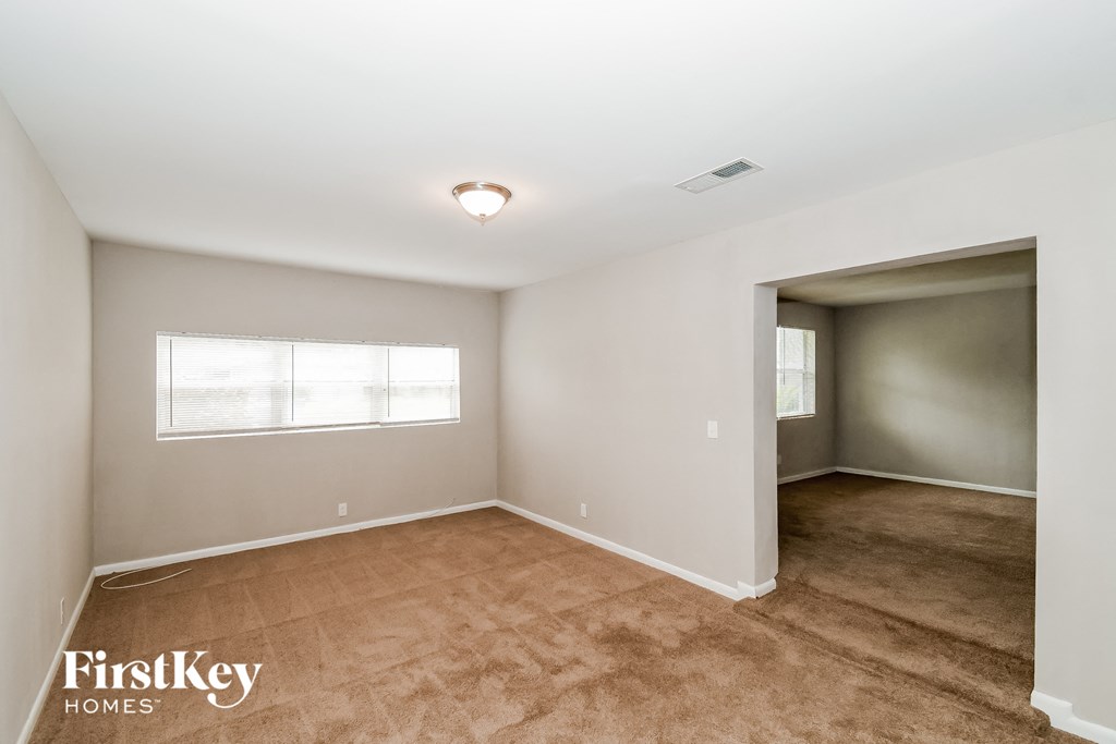 the living room and dining room are spacious and clean