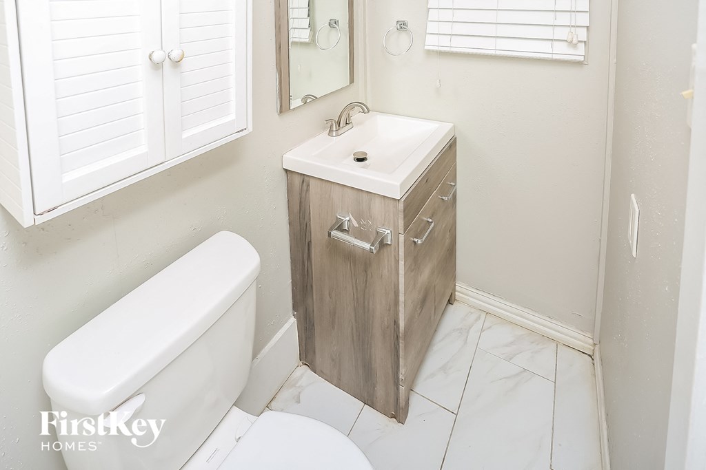 a small bathroom with a toilet and a sink