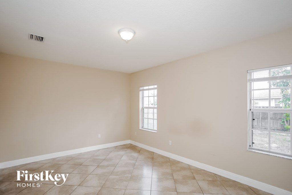 the spacious living room is clean and ready for you to use