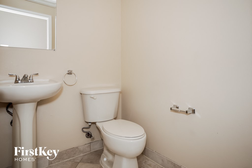 a small bathroom with a toilet and a sink