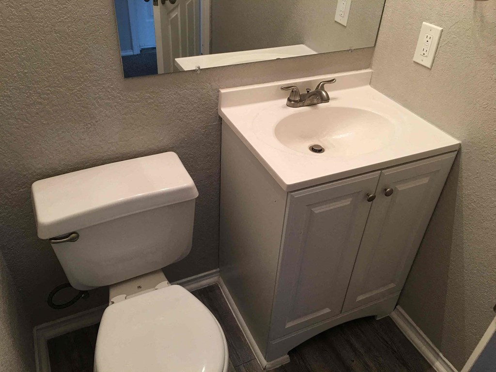 a small bathroom with a toilet and a sink