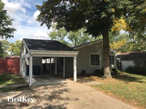 A house with a garage is for sale by FirstKey Homes.