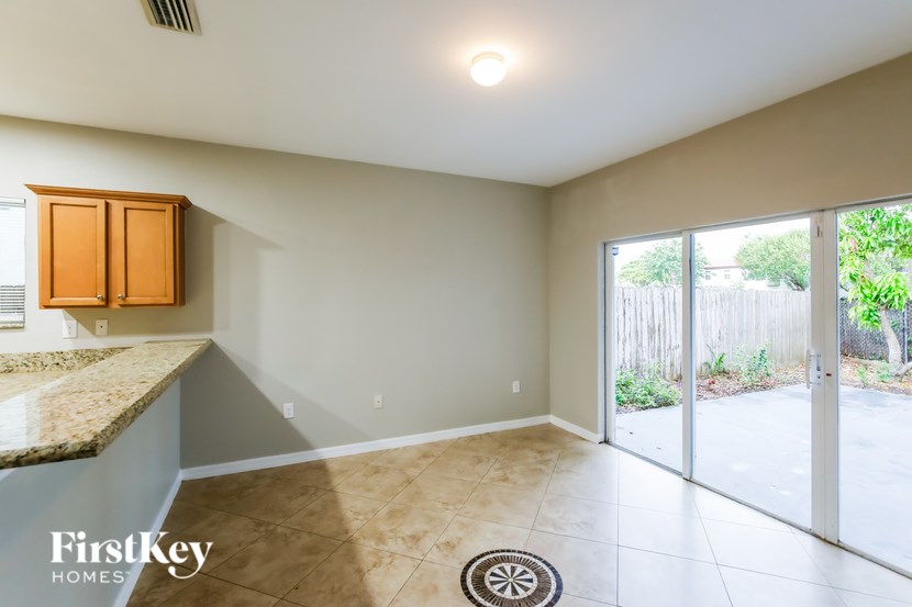 A room with a FirstKey Homes logo on the floor.