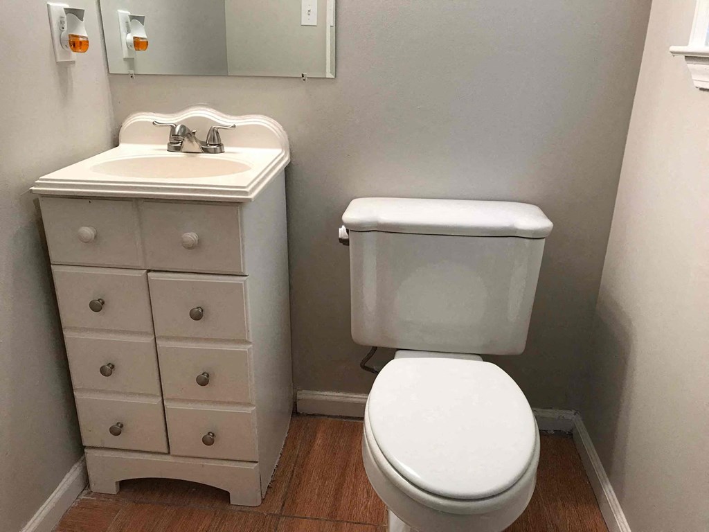 a small bathroom with a toilet and a sink