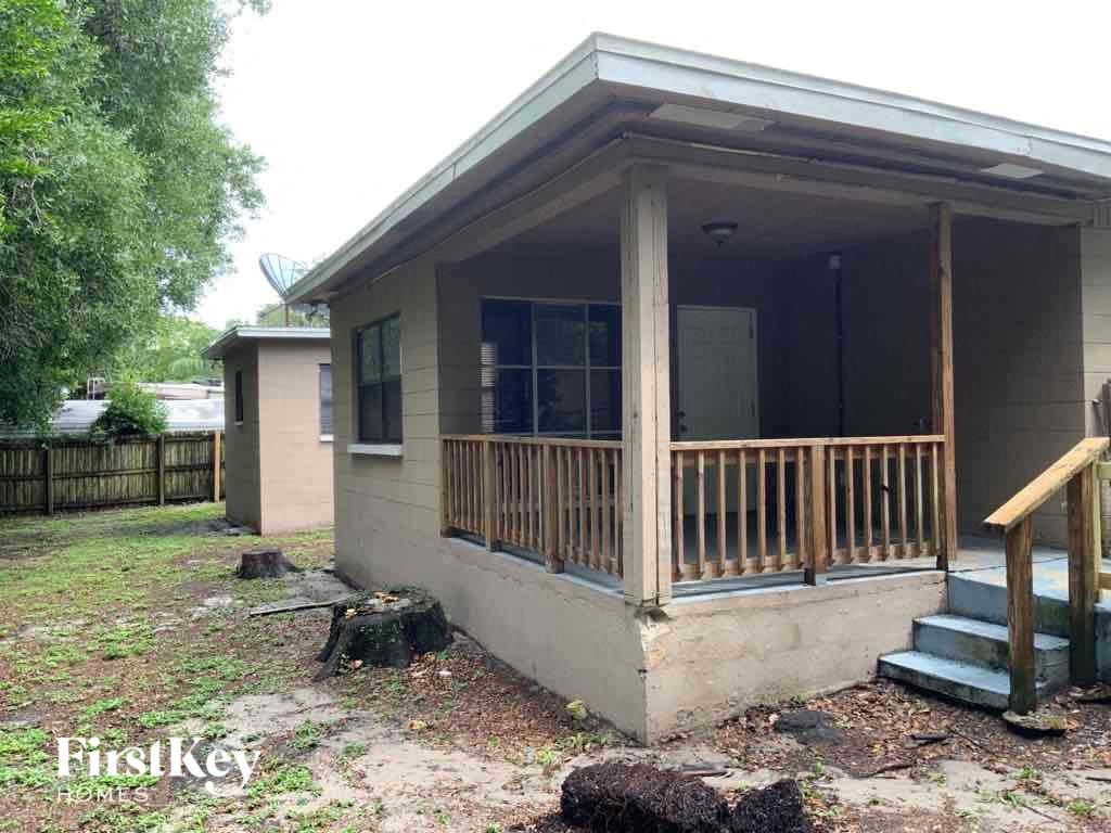 the front porch of the house that was damaged by a tornado